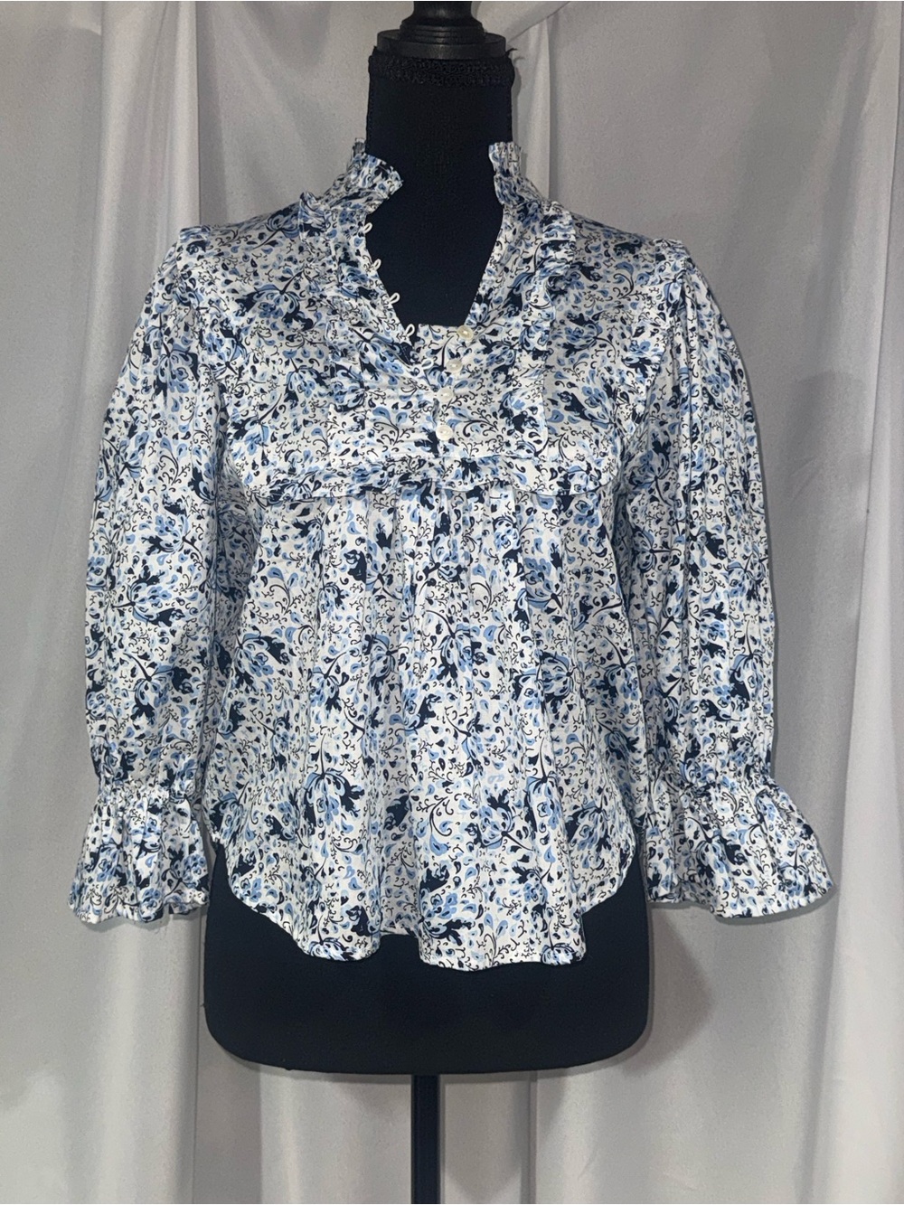 Francesca's Collections White Blouse with Blue Floral Ruffle Details